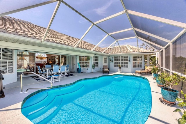11 Amberjack Ln, Placida, FL 33946 - pool featuring glass enclosure and a patio area