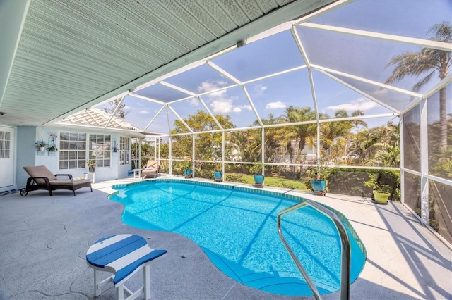 11 Amberjack Ln, Placida, FL 33946 - outdoor pool featuring a patio and glass enclosure