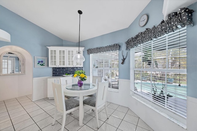11 Amberjack Ln, Placida, FL 33946 - dining space featuring light tile patterned floors and lofted ceiling