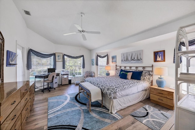 11 Amberjack Ln, Placida, FL 33946 - bedroom featuring visible vents, ceiling fan, wood finished floors, and vaulted ceiling