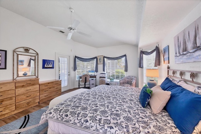11 Amberjack Ln, Placida, FL 33946 - bedroom with wood finished floors, a ceiling fan, and lofted ceiling