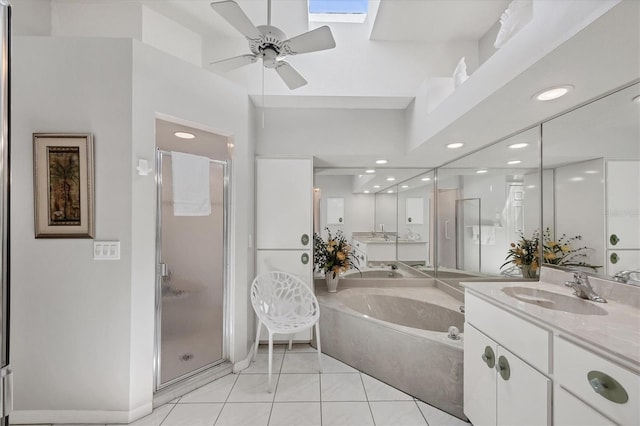 11 Amberjack Ln, Placida, FL 33946 - full bathroom with vanity, a garden tub, ceiling fan, recessed lighting, and a shower stall