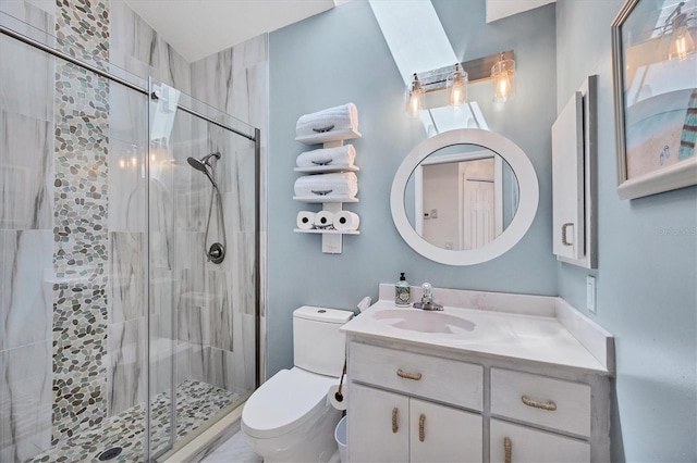 11 Amberjack Ln, Placida, FL 33946 - bathroom featuring vanity, toilet, and a stall shower
