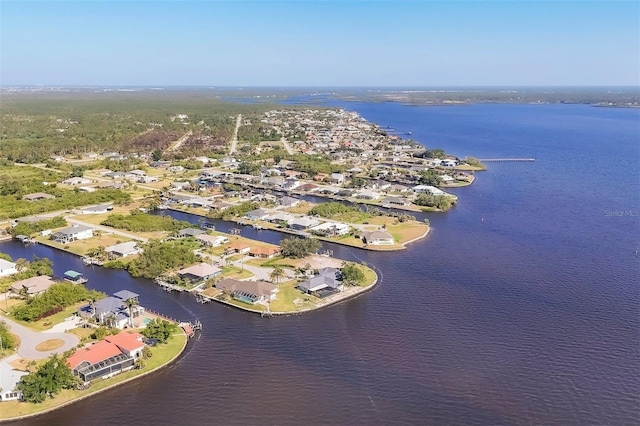 aerial view with a water view and a residential view