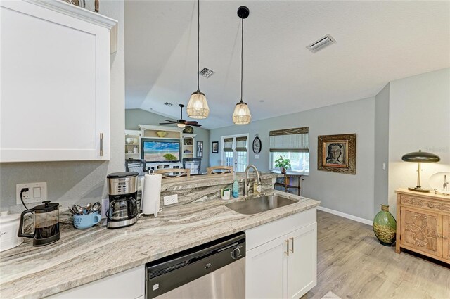 9211 Koma St, Port Charlotte, FL 33981 - kitchen with a ceiling fan, visible vents, a sink, and dishwasher