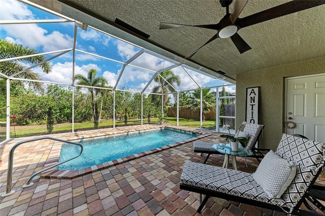 9211 Koma St, Port Charlotte, FL 33981 - pool with a patio, a ceiling fan, and glass enclosure