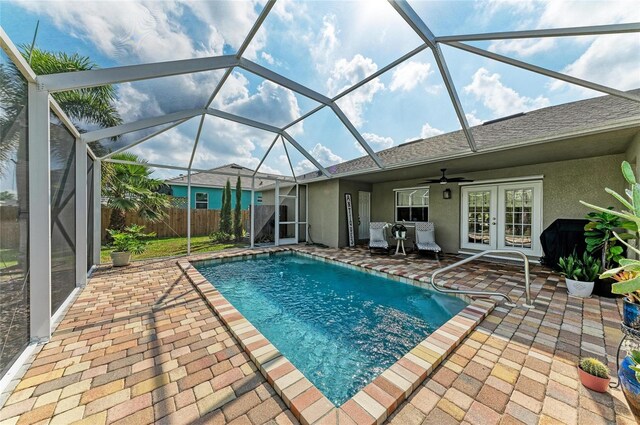 9211 Koma St, Port Charlotte, FL 33981 - view of pool featuring a patio area, ceiling fan, french doors, and a fenced in pool