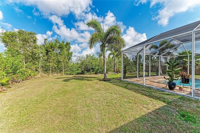 9211 Koma St, Port Charlotte, FL 33981 - view of yard with a patio area, a lanai, and an outdoor pool