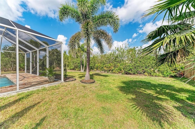 9211 Koma St, Port Charlotte, FL 33981 - view of yard with an outdoor pool and glass enclosure