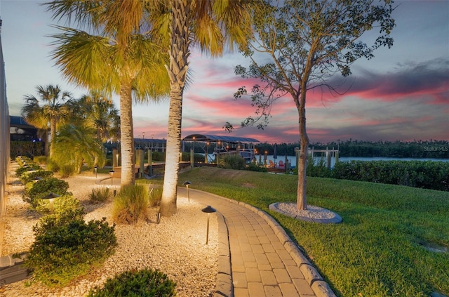 15176 Spanish Point Dr, Port Charlotte, FL 33981 - view of green lawn with a water view