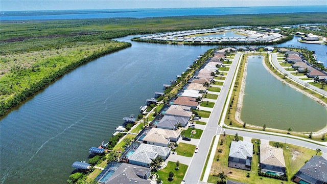 15176 Spanish Point Dr, Port Charlotte, FL 33981 - aerial view of residential area featuring a large body of water