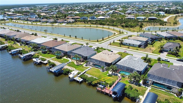 15176 Spanish Point Dr, Port Charlotte, FL 33981 - aerial perspective of suburban area with a nearby body of water