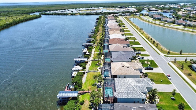 15176 Spanish Point Dr, Port Charlotte, FL 33981 - aerial perspective of suburban area featuring a nearby body of water