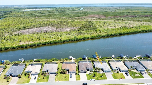 15176 Spanish Point Dr, Port Charlotte, FL 33981 - aerial overview of property's location with nearby suburban area and a large body of water