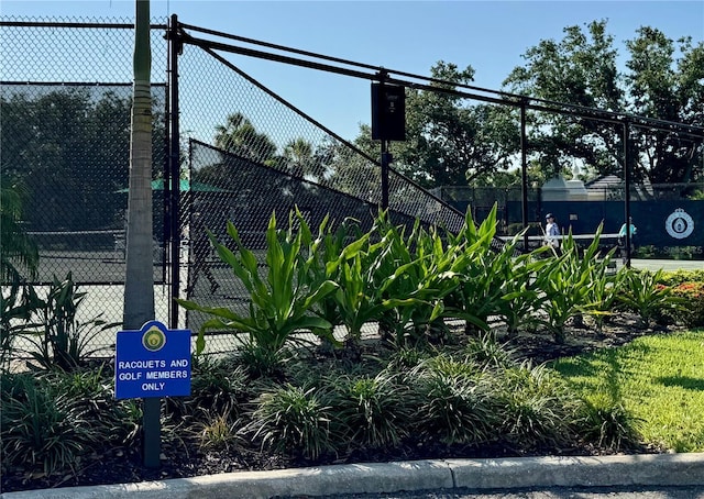 1 Curacao Cir Unit 44, Englewood, FL 34223 - view of tennis court featuring fence