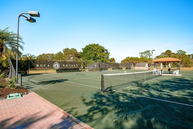1 Curacao Cir Unit 44, Englewood, FL 34223 - view of tennis court with fence and a gazebo