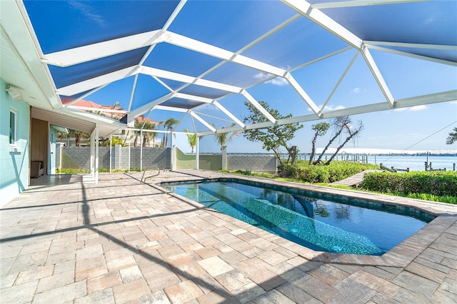 4093 Pelican Shores Cir, Englewood, FL 34223 - outdoor pool featuring a patio, a lanai, and a water view