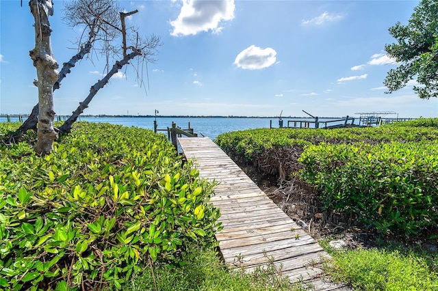 4093 Pelican Shores Cir, Englewood, FL 34223 - dock area featuring a water view
