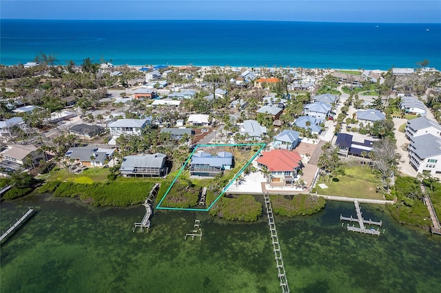 4093 Pelican Shores Cir, Englewood, FL 34223 - aerial perspective of suburban area featuring a large body of water and property boundaries highlighted