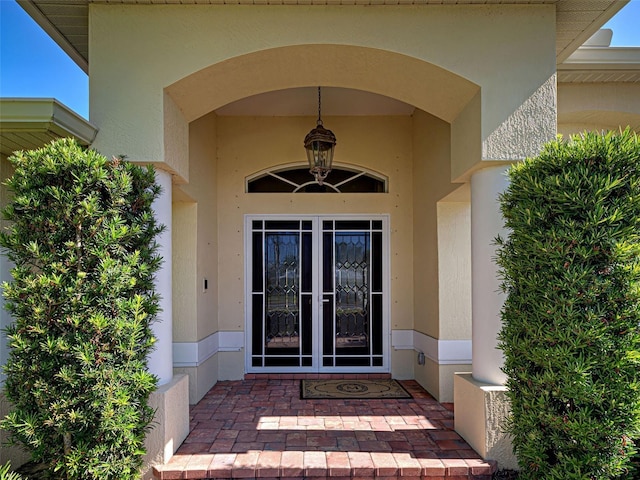 237 Rotonda Blvd E, Rotonda West, FL 33947 - property entrance featuring stucco siding