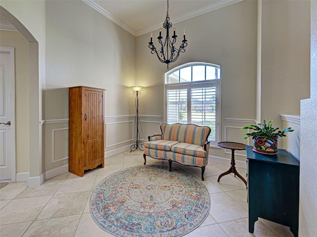 237 Rotonda Blvd E, Rotonda West, FL 33947 - living area featuring a chandelier, crown molding, arched walkways, light tile patterned flooring, and a high ceiling