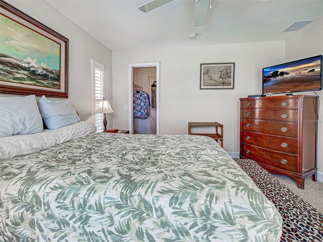237 Rotonda Blvd E, Rotonda West, FL 33947 - bedroom featuring carpet flooring and a ceiling fan