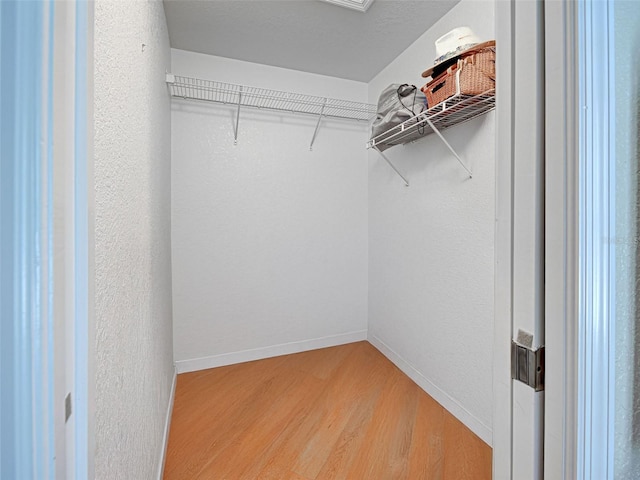 237 Rotonda Blvd E, Rotonda West, FL 33947 - spacious closet with light wood finished floors