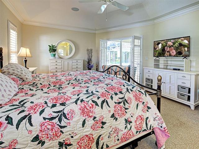 237 Rotonda Blvd E, Rotonda West, FL 33947 - carpeted bedroom with multiple windows, ornamental molding, ceiling fan, access to exterior, and a raised ceiling