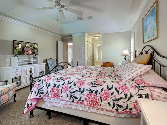 237 Rotonda Blvd E, Rotonda West, FL 33947 - bedroom featuring carpet floors, crown molding, a raised ceiling, connected bathroom, and a ceiling fan