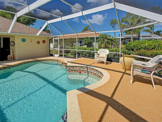 237 Rotonda Blvd E, Rotonda West, FL 33947 - outdoor pool featuring a patio and glass enclosure