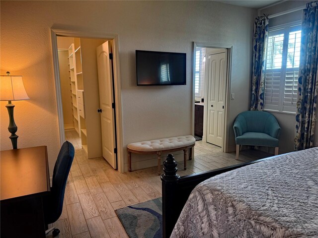174 Broadmoor Ln, Rotonda West, FL 33947 - bedroom with light wood-style floors