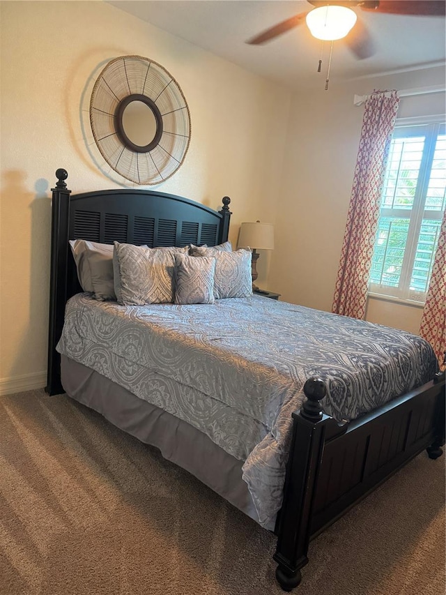 174 Broadmoor Ln, Rotonda West, FL 33947 - bedroom with carpet and ceiling fan
