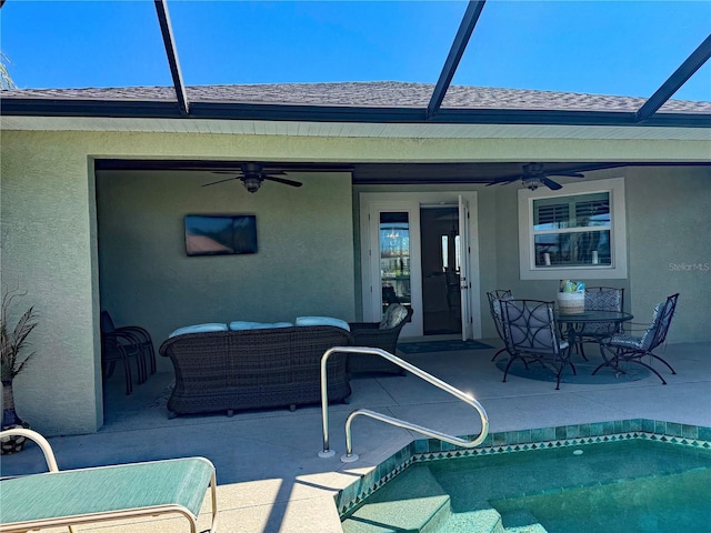 174 Broadmoor Ln, Rotonda West, FL 33947 - outdoor pool with a ceiling fan, an outdoor living space, a patio, and a lanai