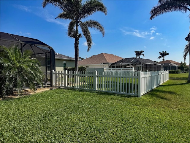 174 Broadmoor Ln, Rotonda West, FL 33947 - fenced backyard with a lanai