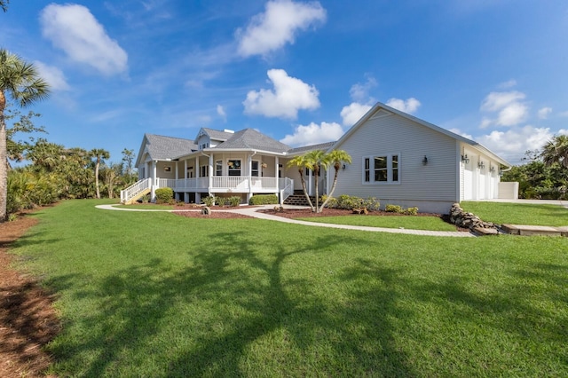 9144 Spring Valley Rd, Englewood, FL 34224 - view of front facade featuring a porch, a garage, a front yard, and driveway