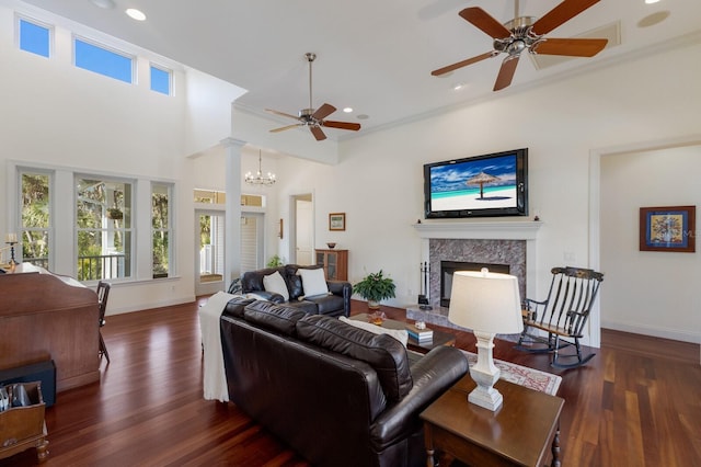 9144 Spring Valley Rd, Englewood, FL 34224 - living area with a high end fireplace, ceiling fan, baseboards, wood finished floors, and recessed lighting