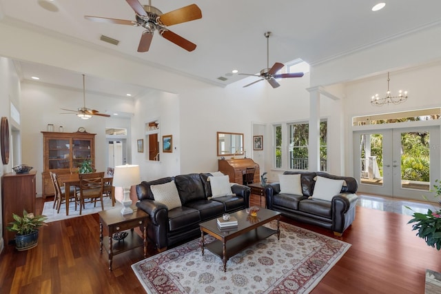 9144 Spring Valley Rd, Englewood, FL 34224 - living room with a ceiling fan, french doors, wood finished floors, recessed lighting, and ornamental molding