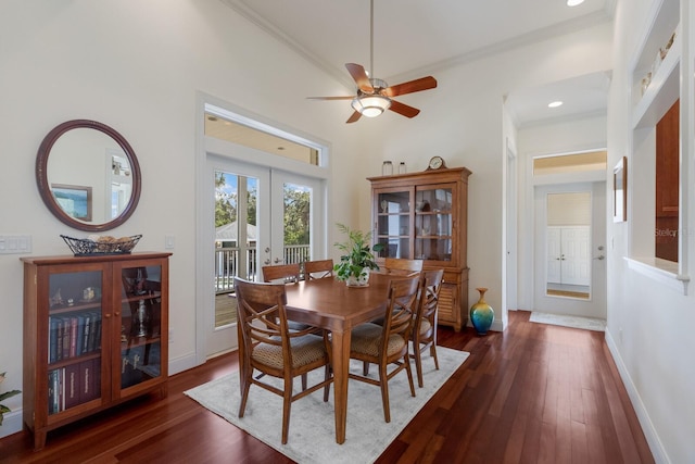 9144 Spring Valley Rd, Englewood, FL 34224 - dining area with ceiling fan, crown molding, french doors, dark wood-style floors, and baseboards