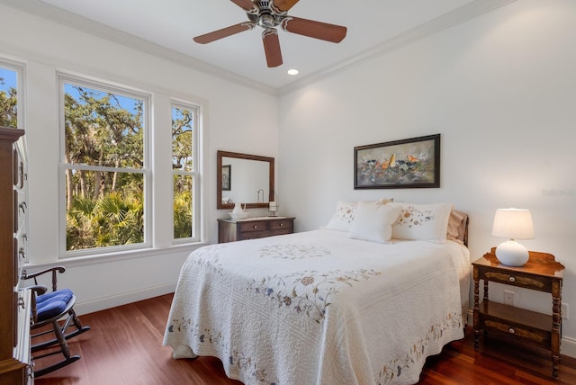 9144 Spring Valley Rd, Englewood, FL 34224 - bedroom featuring baseboards, crown molding, wood finished floors, a ceiling fan, and recessed lighting