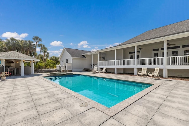 9144 Spring Valley Rd, Englewood, FL 34224 - view of pool featuring ceiling fan, a patio area, and a pool with connected hot tub