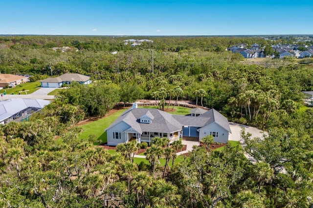 9144 Spring Valley Rd, Englewood, FL 34224 - aerial view of property and surrounding area with a forest