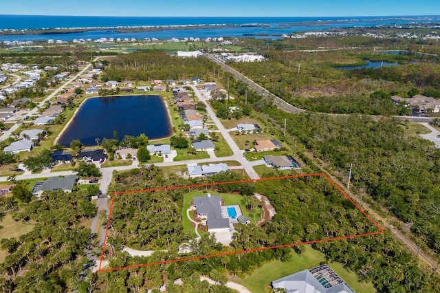 9144 Spring Valley Rd, Englewood, FL 34224 - aerial perspective of suburban area featuring a nearby body of water and property boundaries highlighted