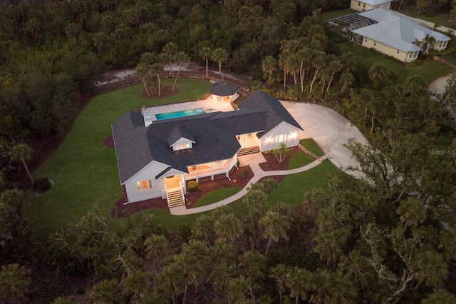9144 Spring Valley Rd, Englewood, FL 34224 - aerial view of property and surrounding area featuring a forest