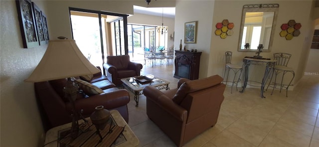 19 Medalist Way, Rotonda West, FL 33947 - living area featuring a chandelier and light tile patterned floors