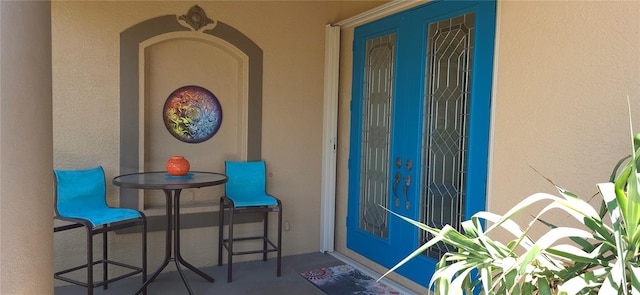 19 Medalist Way, Rotonda West, FL 33947 - property entrance featuring stucco siding