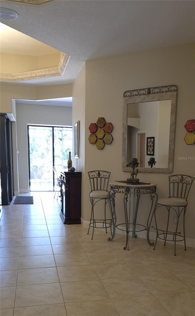 19 Medalist Way, Rotonda West, FL 33947 - hallway featuring light tile patterned floors and baseboards