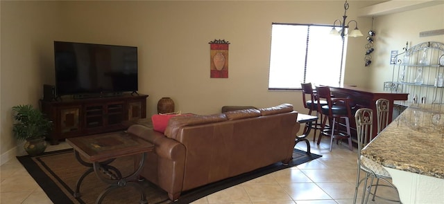 19 Medalist Way, Rotonda West, FL 33947 - living room featuring light tile patterned floors