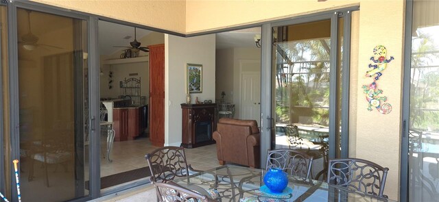 19 Medalist Way, Rotonda West, FL 33947 - dining space with a ceiling fan, plenty of natural light, and light tile patterned floors