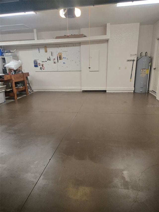 19 Medalist Way, Rotonda West, FL 33947 - garage with electric water heater and a garage door opener