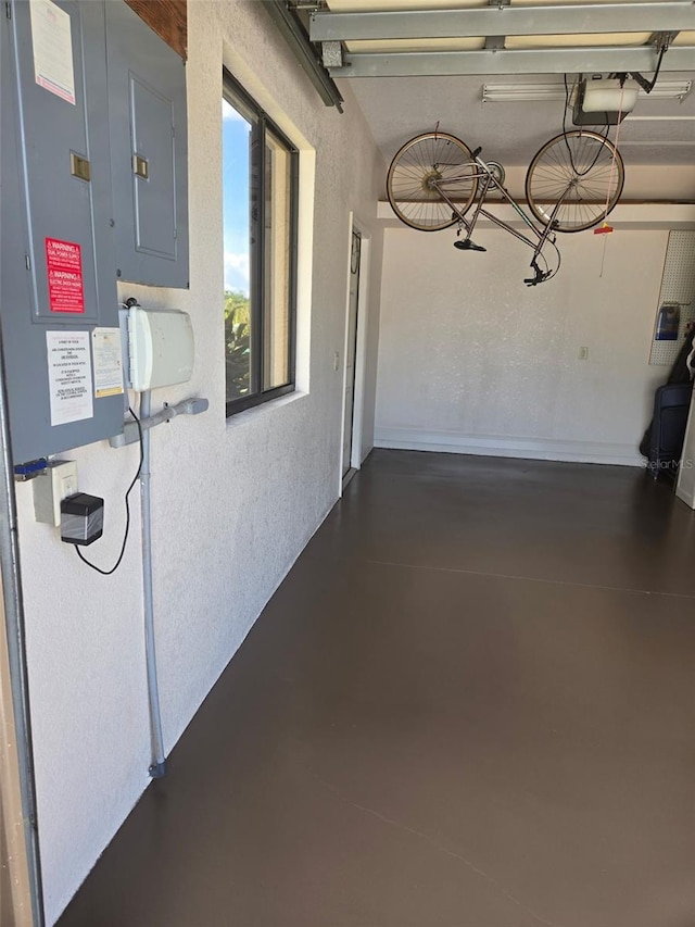 19 Medalist Way, Rotonda West, FL 33947 - garage with a textured wall and a garage door opener